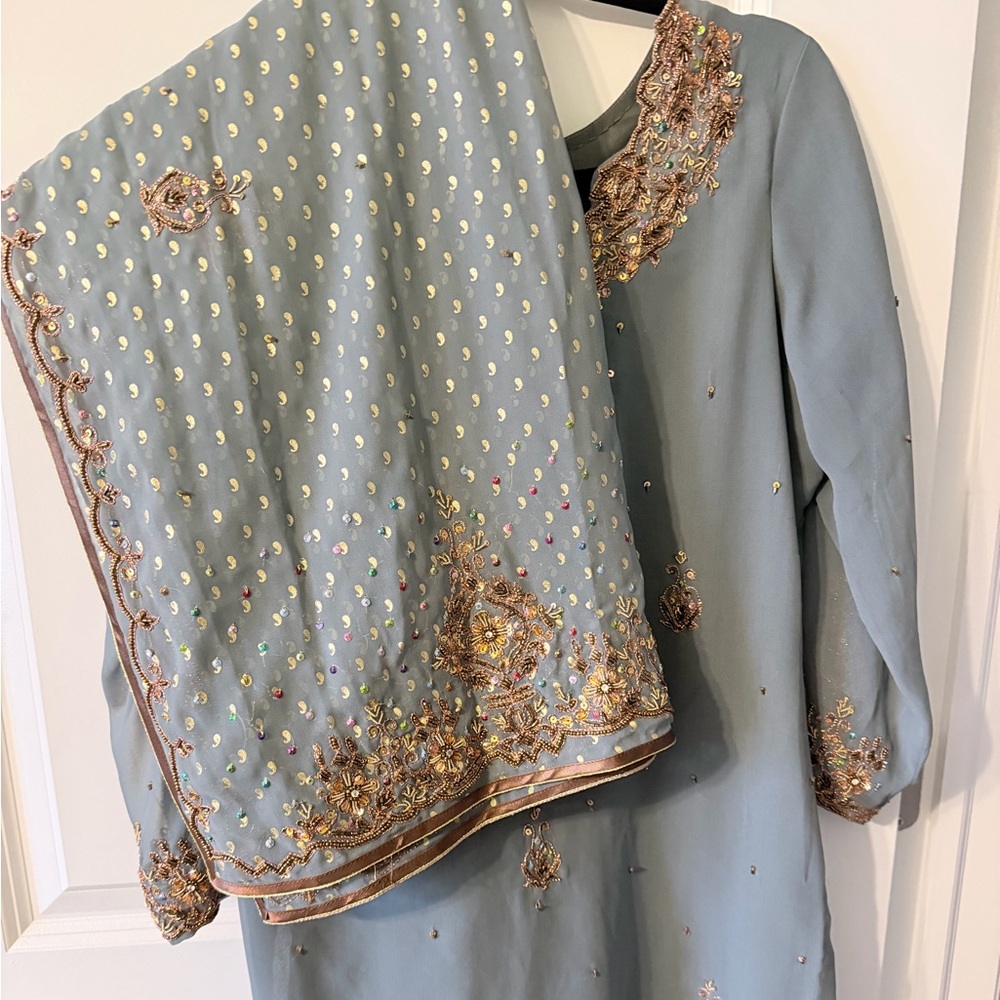 Beautiful gray shalwar kameez with multi colored and gold accents
